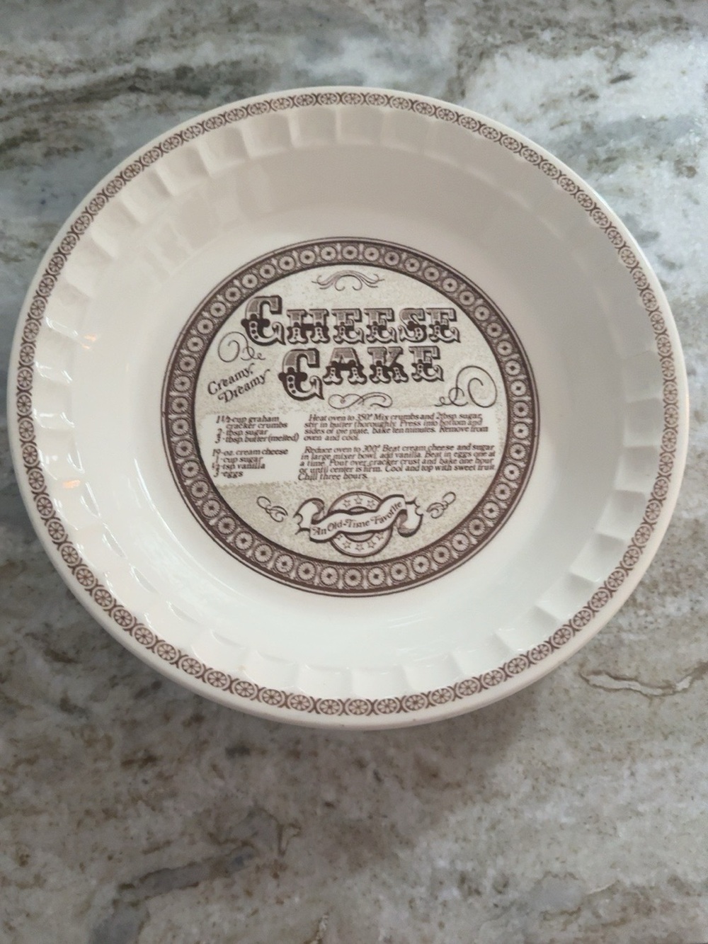 Cream Ceramic Cheesecake Serving Dish with Brown Recipe Transfer